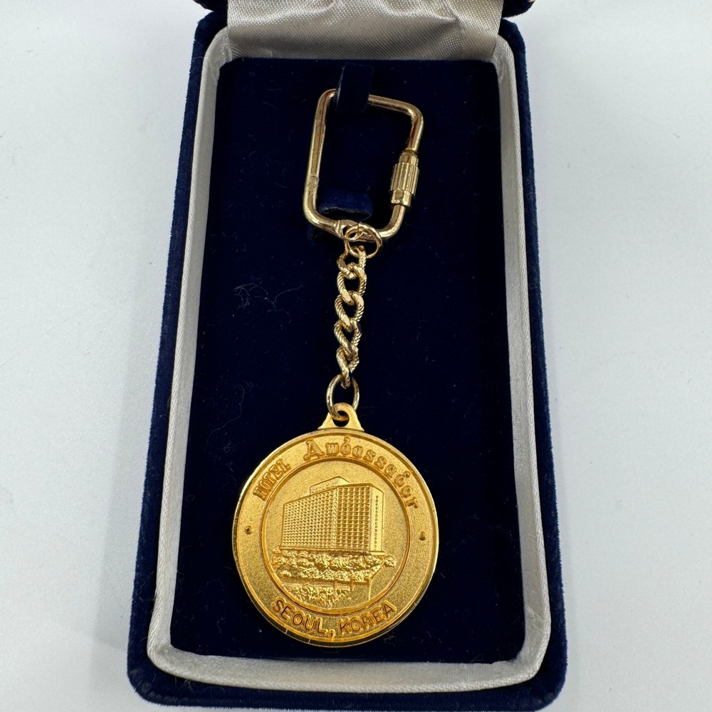 Vintage Hotel Ambassador Seoul Korea Gold Tone Medallion Keychain with Box